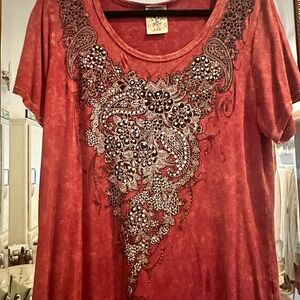 Rust colored soft top with embellishments.  Size large.